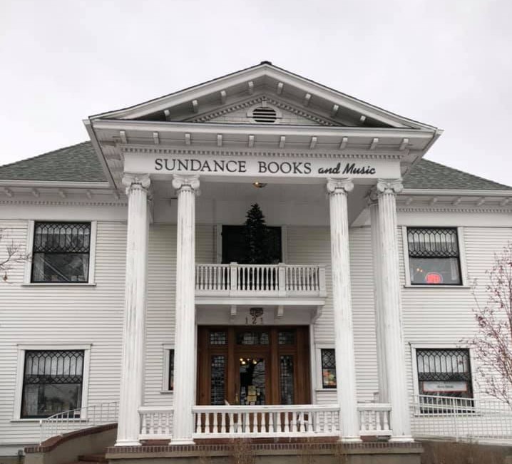 Front view of Levy Mansion and Sundance Books