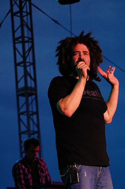 Adam duritz of counting crows singing on stage