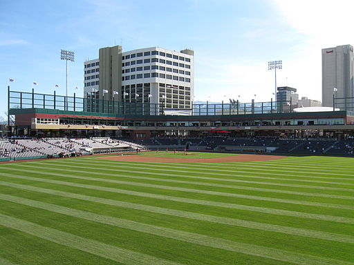 Greater Nevada Field with reno city hall in background