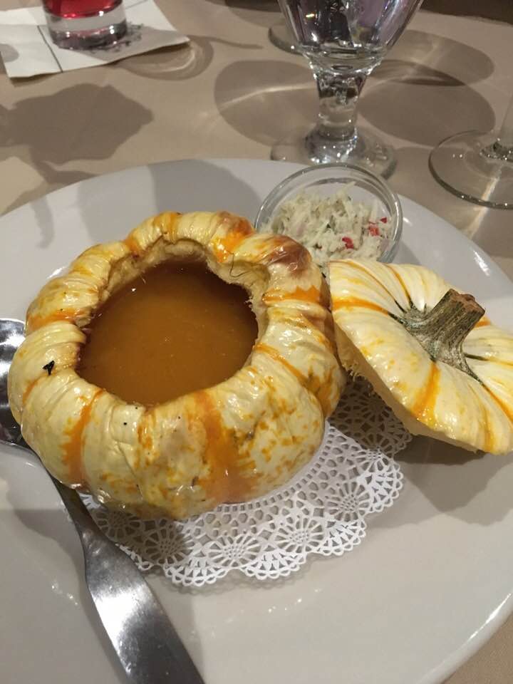 fine dining soup served in a pumpkin 