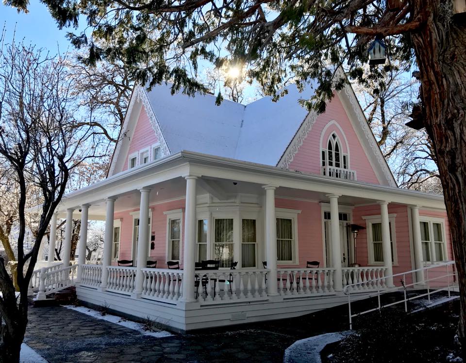 exterior of the pink house in genoa